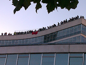 Demonstrators on the roof above Tory HQ